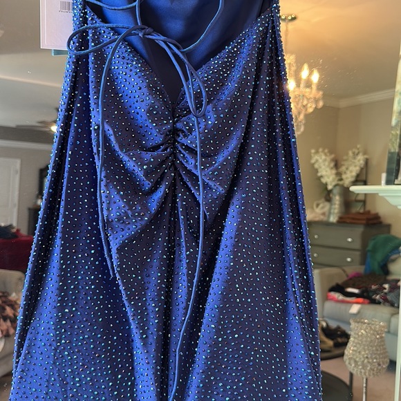 Sherri hill Rhinestone embellished jersey gown deep V neckline and lace up back. - Picture 14 of 17